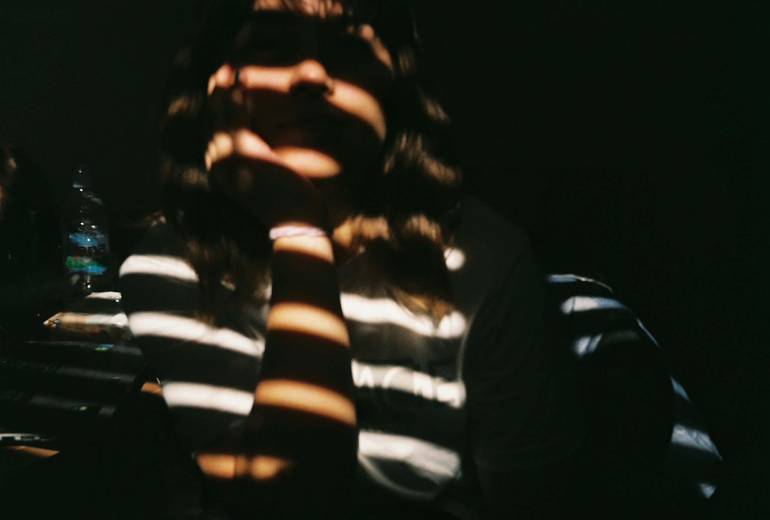 woman with light stripes representing the process of changing your attachment style